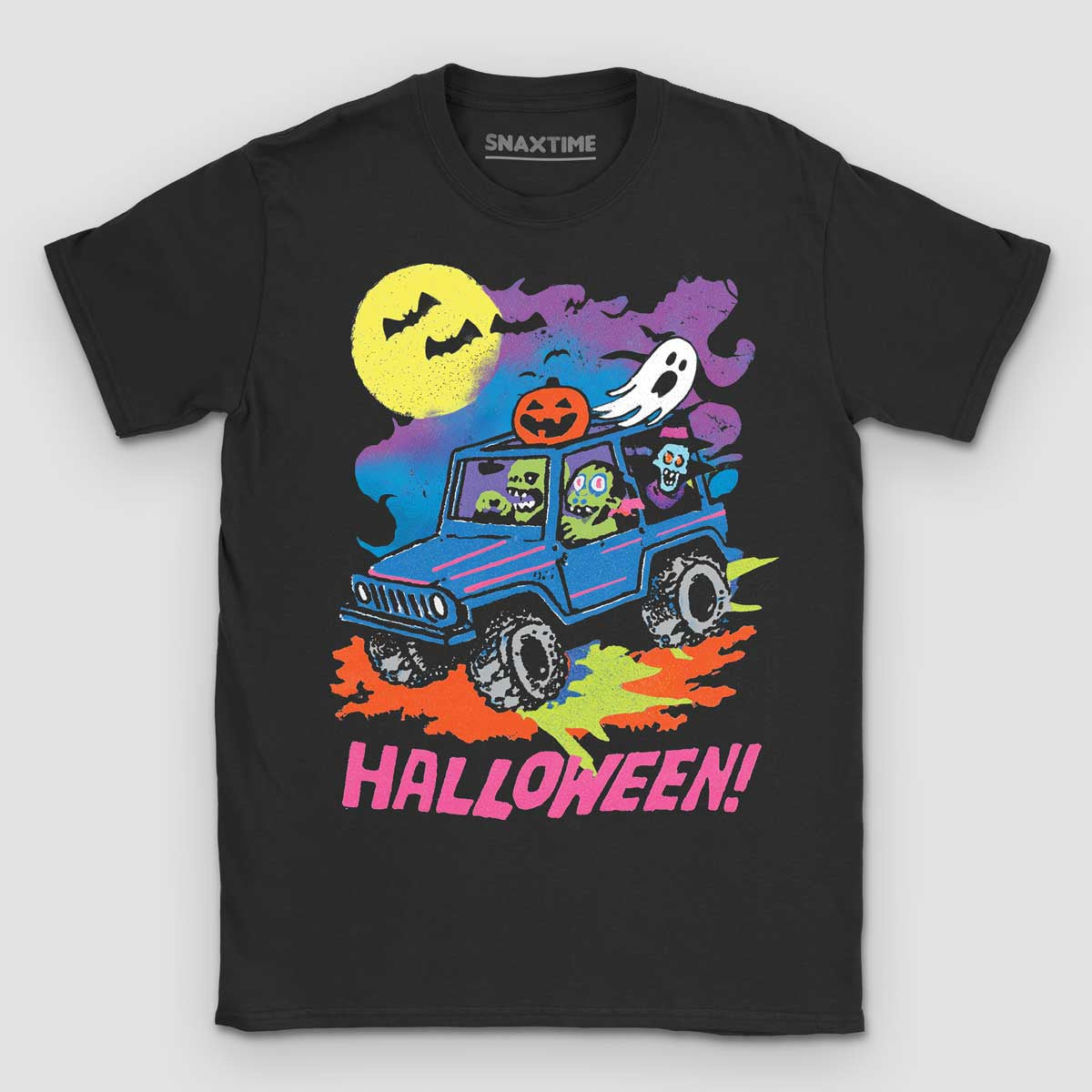 Black unisex Snaxtime t-shirt printed with neon Halloween artwork: two green zombies and a vampire riding a blue monster truck with a jack-o'-lantern on the roof, a white ghost and bats against a full moon, above the word HALLOWEEN in pink brush lettering.
