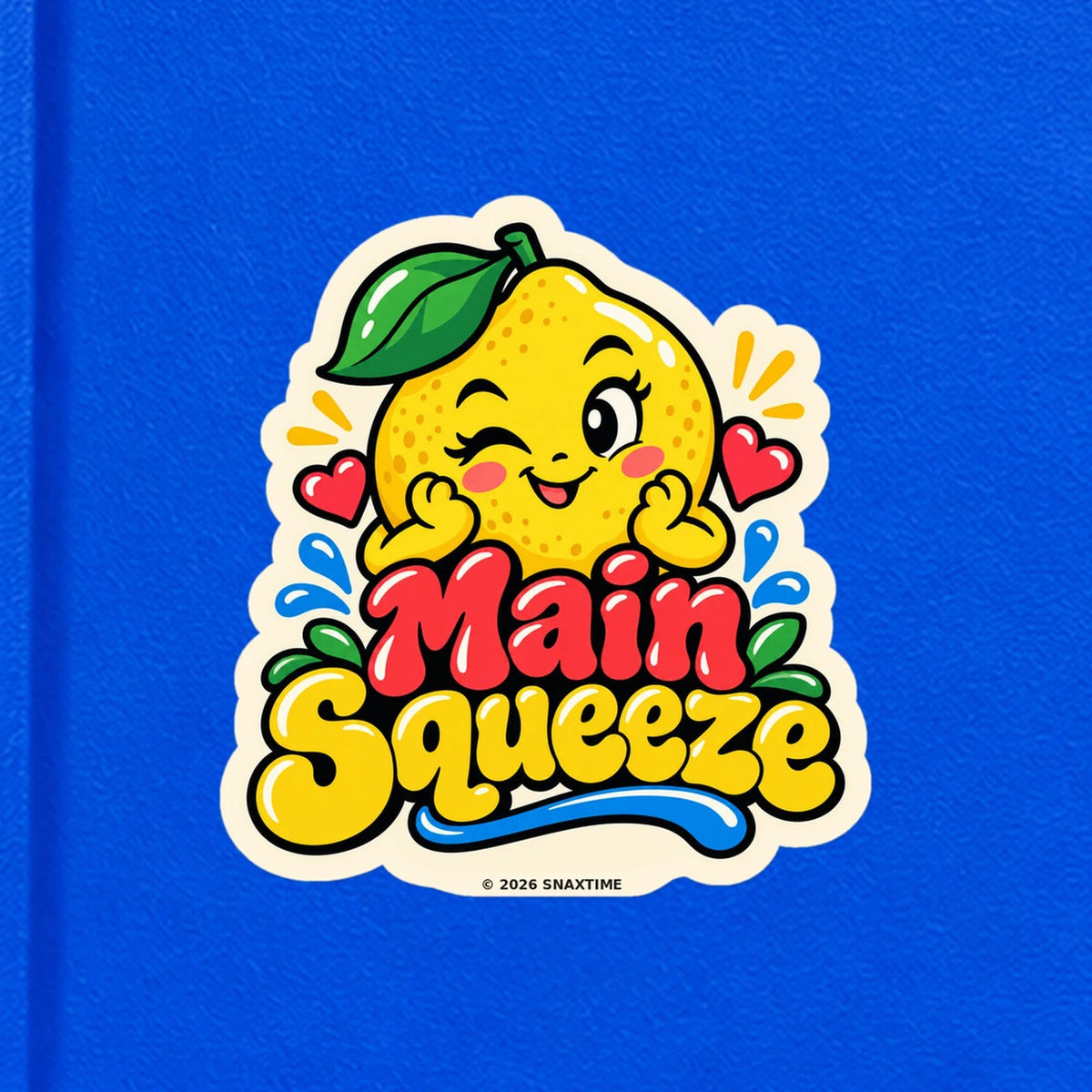 Close-up of the Snaxtime “Main Squeeze” sticker on a notebook; part of Food Pun Sticker Sheet Set 3.