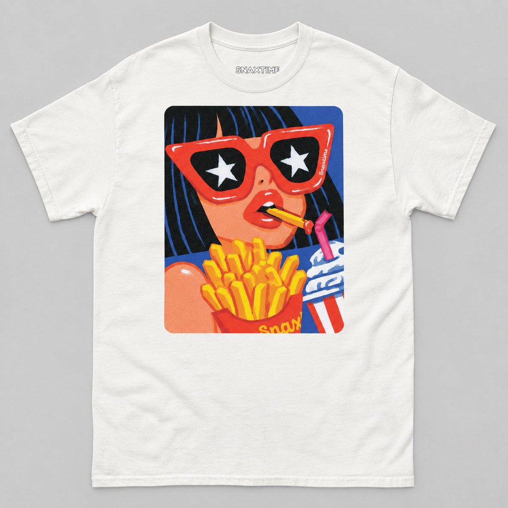 Natural white unisex t-shirt printed with pop art of a woman in oversized red cat-eye sunglasses with white stars in the lenses, biting a french fry, holding a red carton of Snax fries and a milkshake with a pink straw against a cobalt blue background.