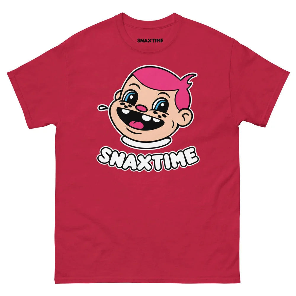 Red unisex t-shirt printed with the Snaxtime mascot, a grinning cartoon kid with pink hair, above bold SNAXTIME lettering outlined in white.