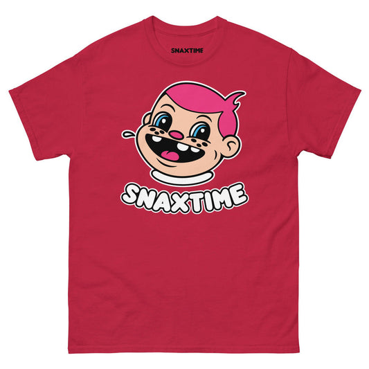 Red unisex t-shirt printed with the Snaxtime mascot, a grinning cartoon kid with pink hair, above bold SNAXTIME lettering outlined in white.