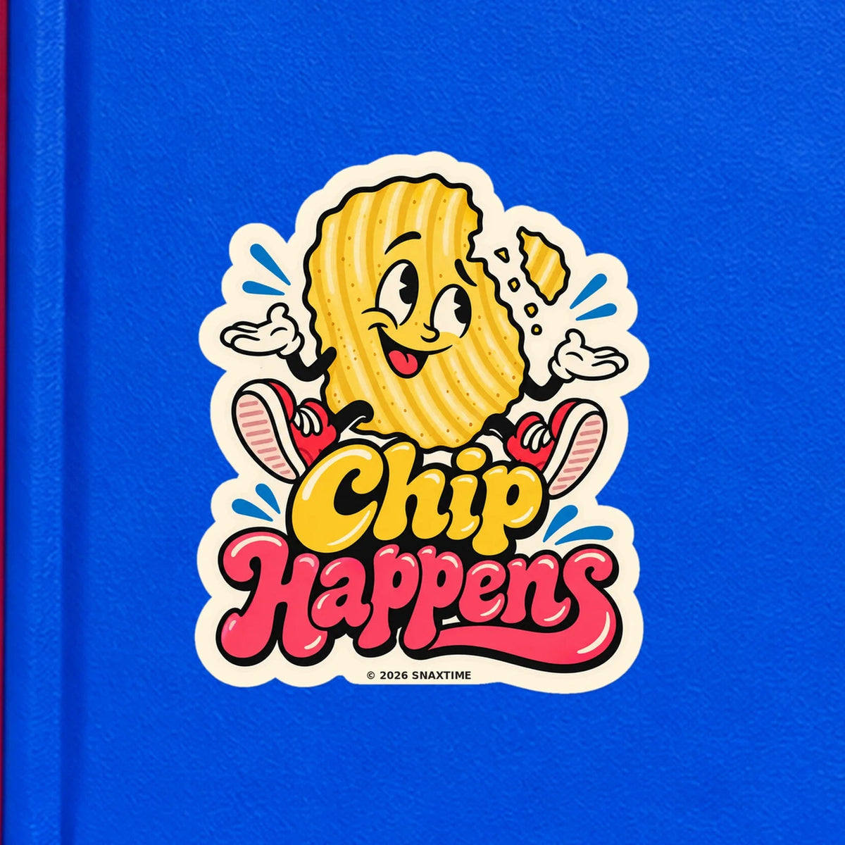 Close-up of the Snaxtime “Chip Happens” sticker on a notebook; part of Food Pun Sticker Sheet Set 2.