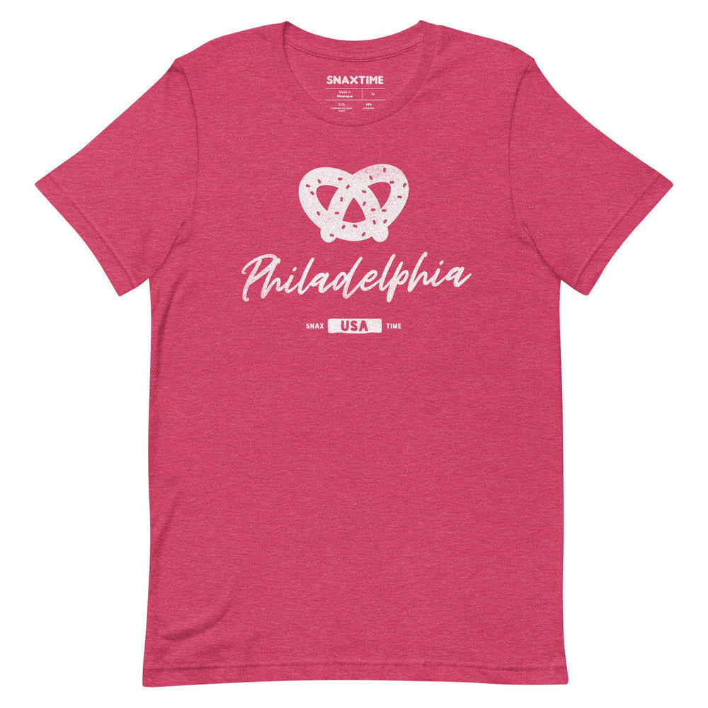 Heather raspberry pink t-shirt with a white soft pretzel and script "Philadelphia" print