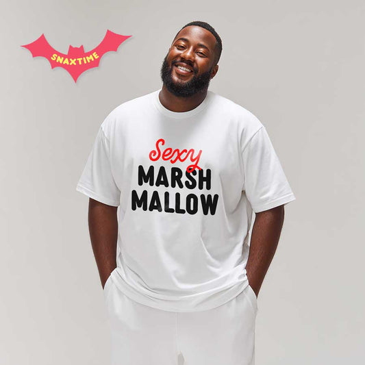 Smiling man wearing a white t-shirt with red script 'Sexy' above black 'Marshmallow'