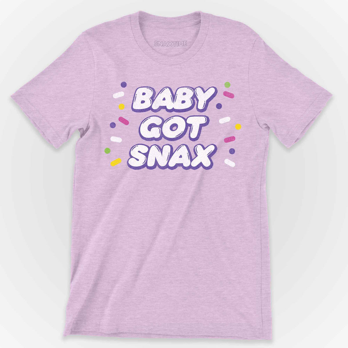 Heather lilac t-shirt with BABY GOT SNAX in white bubble letters ringed by candy sprinkles