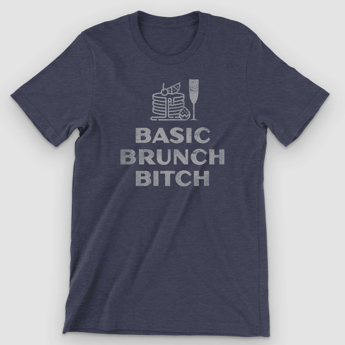 Heather navy t-shirt with a pancake stack, mimosa glass, and distressed BASIC BRUNCH BITCH text