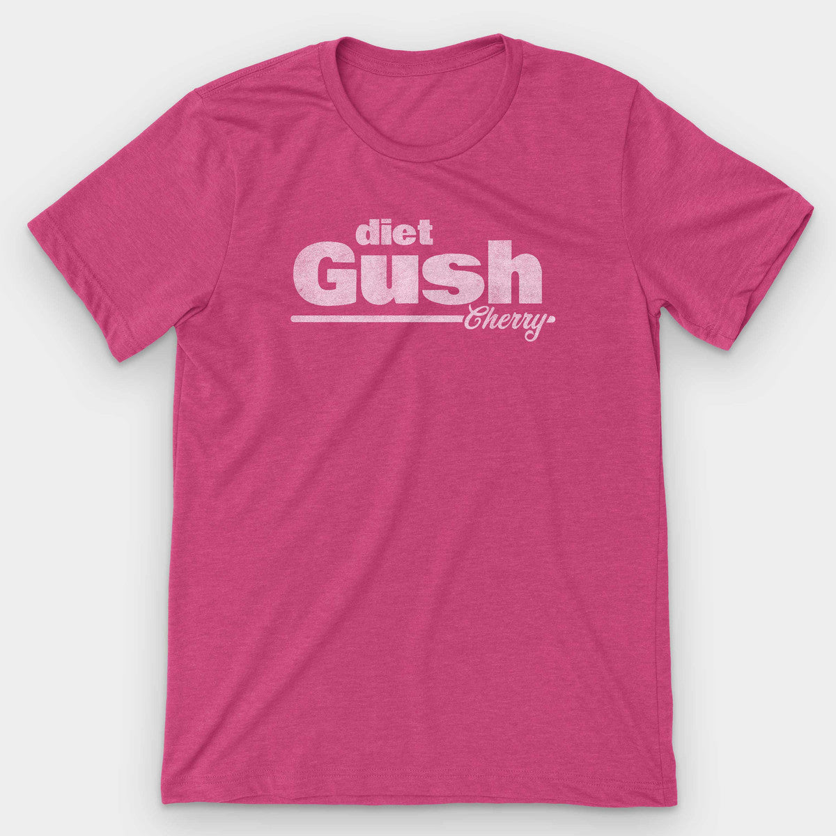 Heather pink t-shirt with a retro diet Gush Cherry soda logo in pale pink