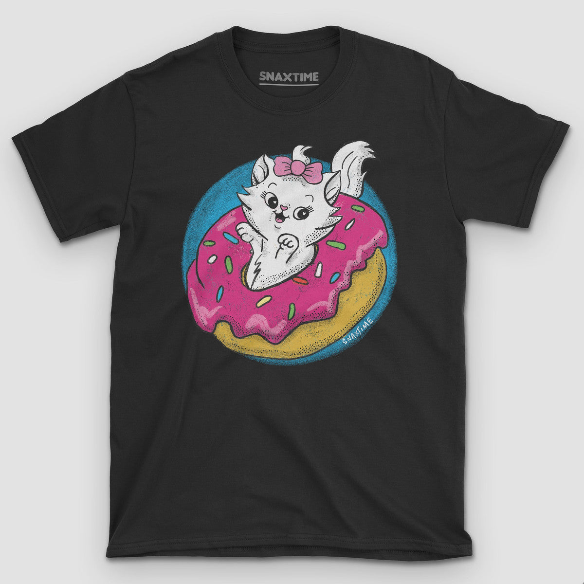 Black t-shirt with a white kitten in a pink bow lounging in a frosted donut