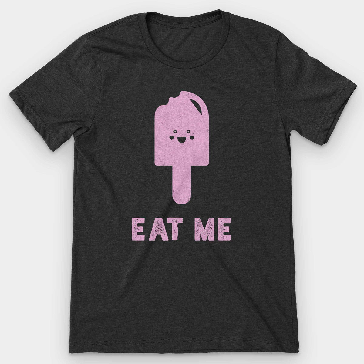 Black heather t-shirt with a pink smiling popsicle and 'Eat Me' text