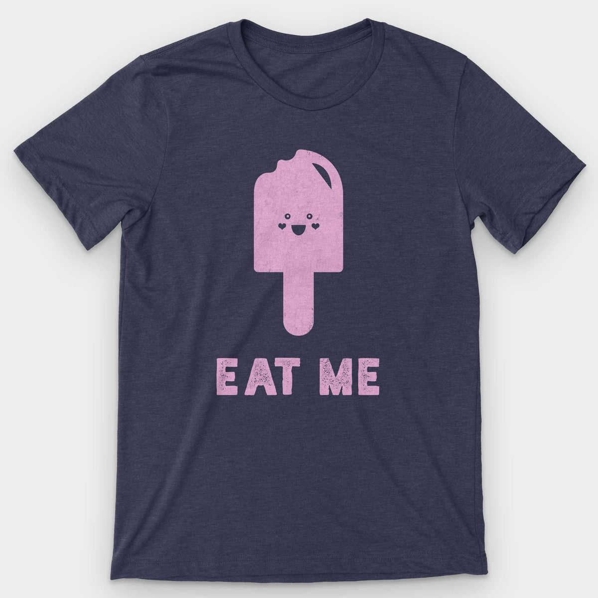 Heather navy t-shirt with a pink smiling popsicle and 'Eat Me' below it