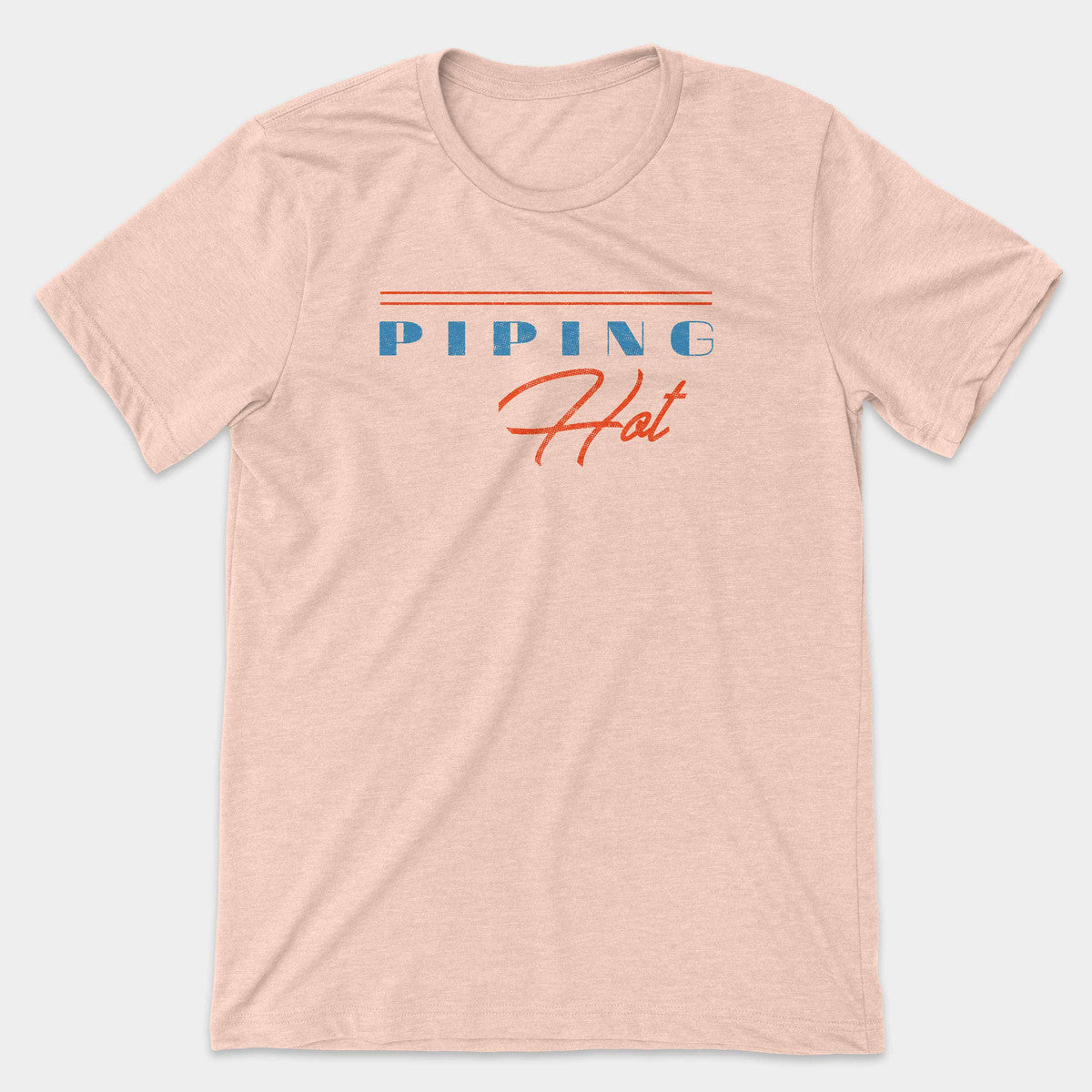 Pale peach t-shirt with retro blue "PIPING" lettering above orange "Hot" script and stripes