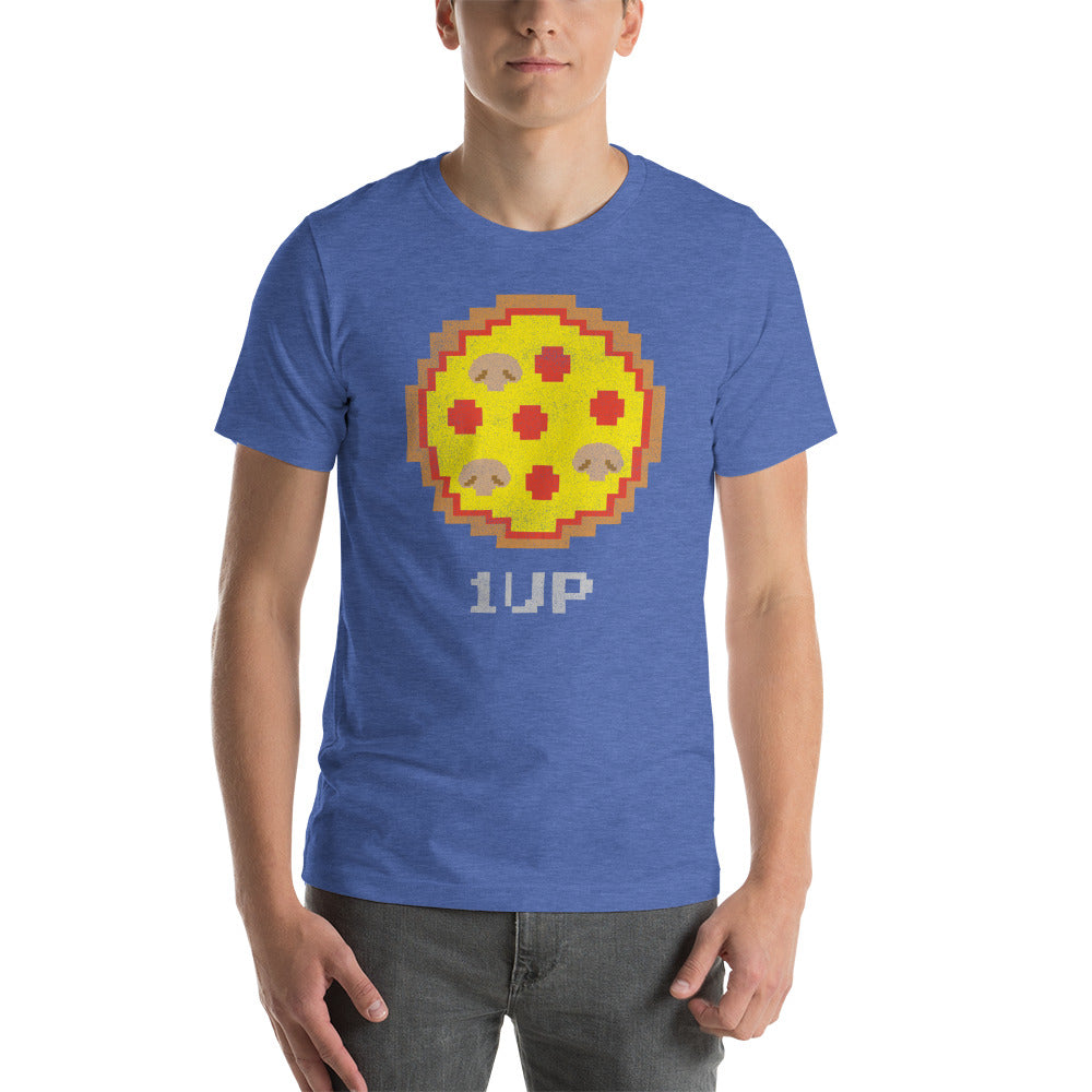 Man wearing the heather true royal 8-bit pizza "1UP" t-shirt with gray jeans