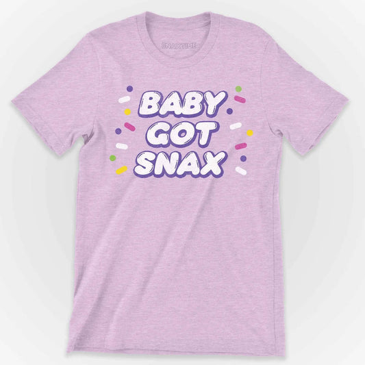 Heather lilac t-shirt with BABY GOT SNAX in white bubble letters ringed by candy sprinkles