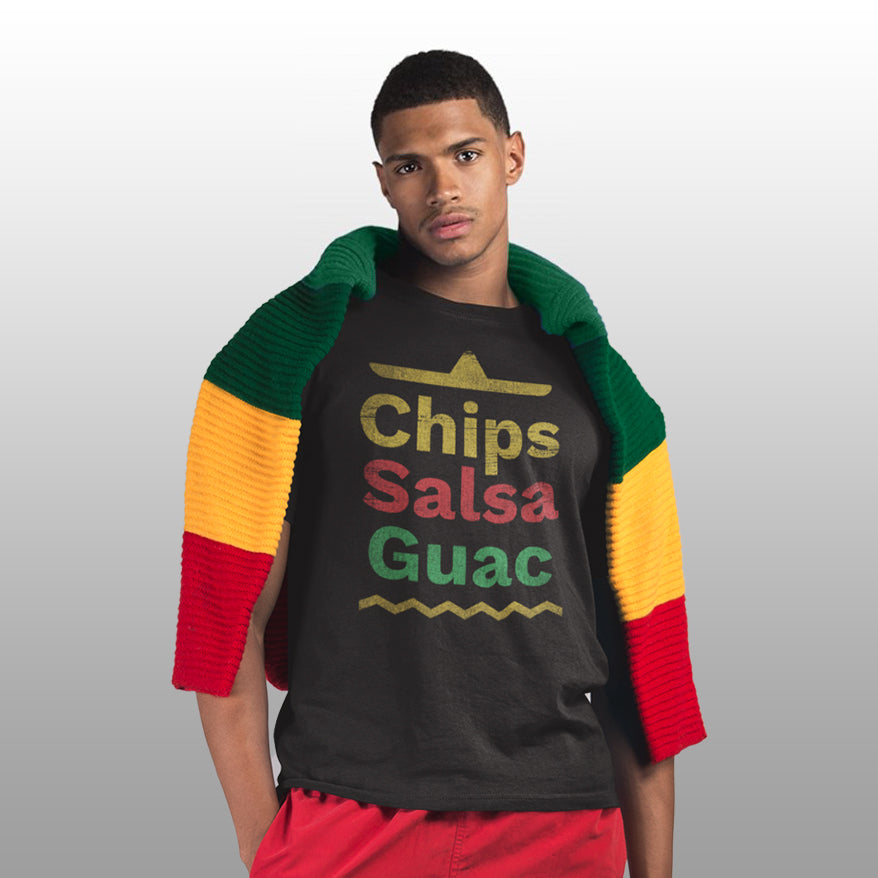 Person wearing the black Chips Salsa Guac tee with a green, yellow and red sweater