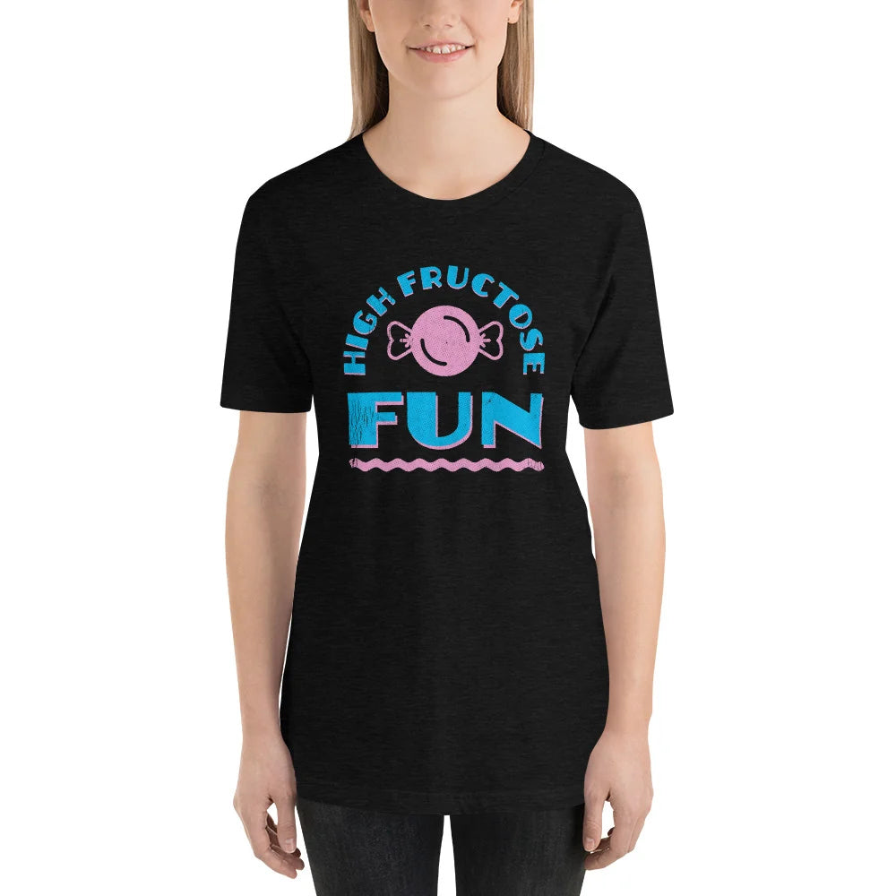Person wearing a black heather t-shirt with a pink candy and blue HIGH FRUCTOSE FUN print