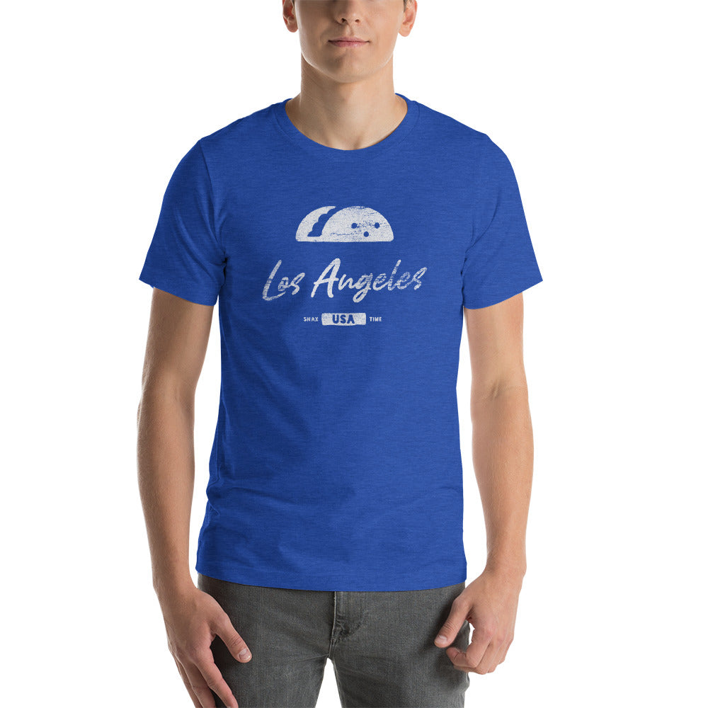 Person wearing a royal blue heather t-shirt with a white taco and Los Angeles script