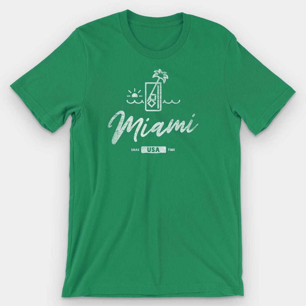 Kelly green t-shirt with a white cocktail glass and sunset graphic above Miami script