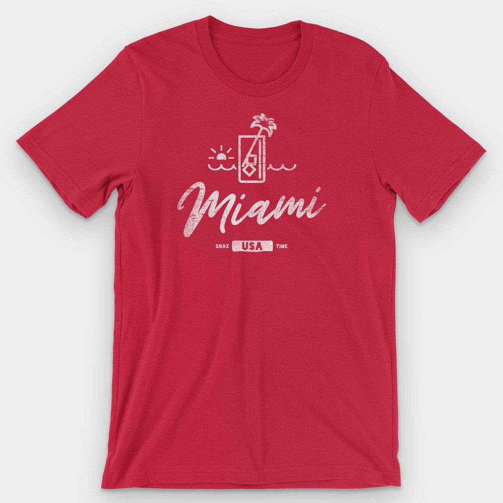 Red t-shirt with a white cocktail glass, palm tree and sunset above Miami script