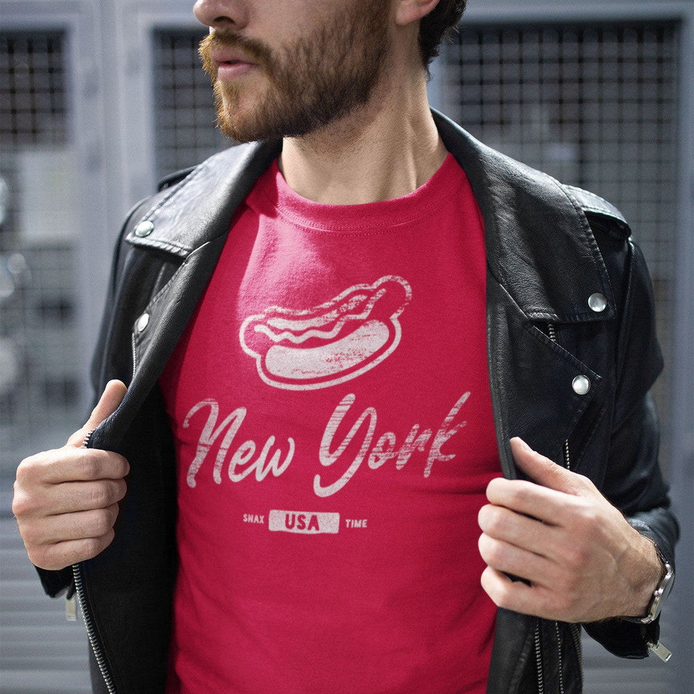 Person opening a leather jacket over a red New York hot dog t-shirt