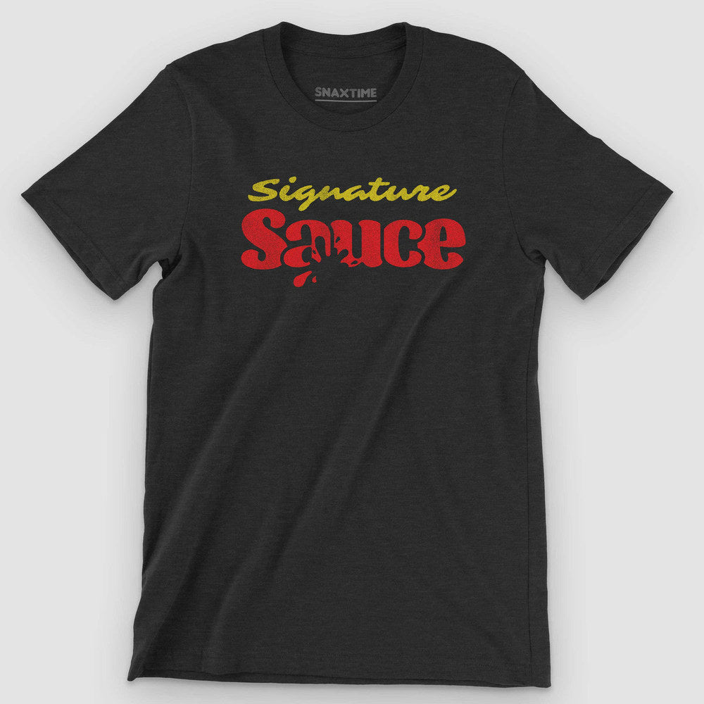 Heather black t-shirt with yellow script 'Signature' above red dripping 'Sauce'